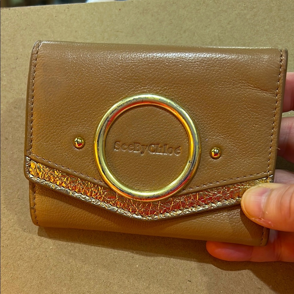 Woman’s See by Chloe SUPER SOFT tan trifold wallet with gold embellishments